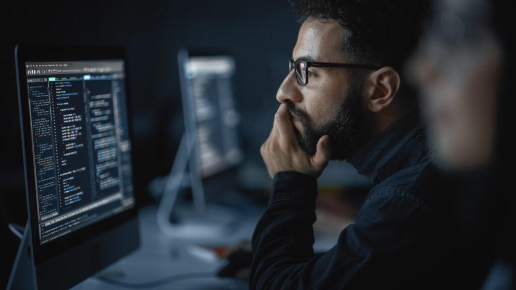 Man looking at computer screen.