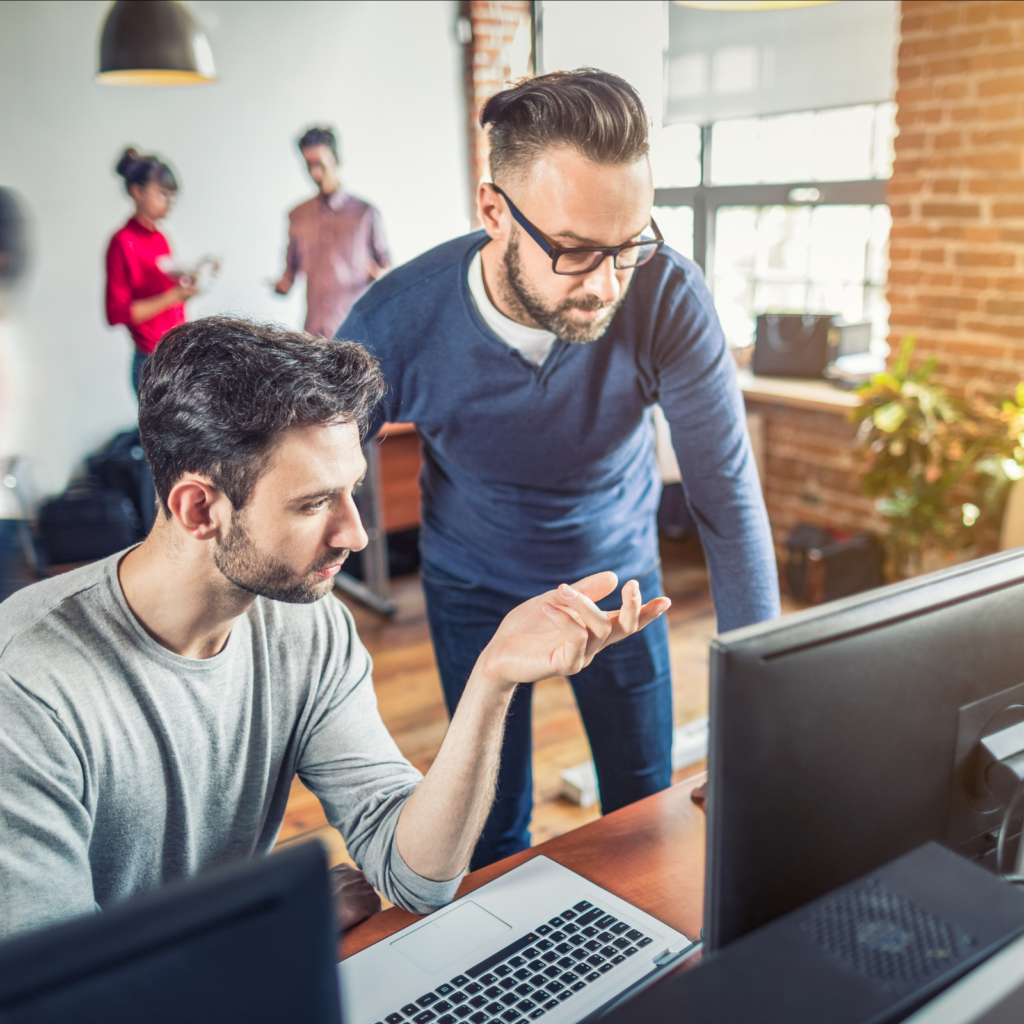 Men at computers