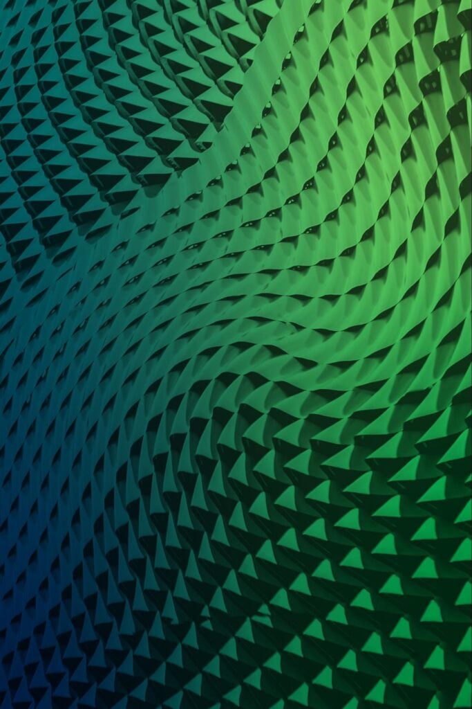 Green background image with wave pattern.